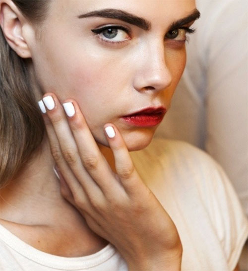 short-white-mani-on-cara.jpg Short white mani on cara